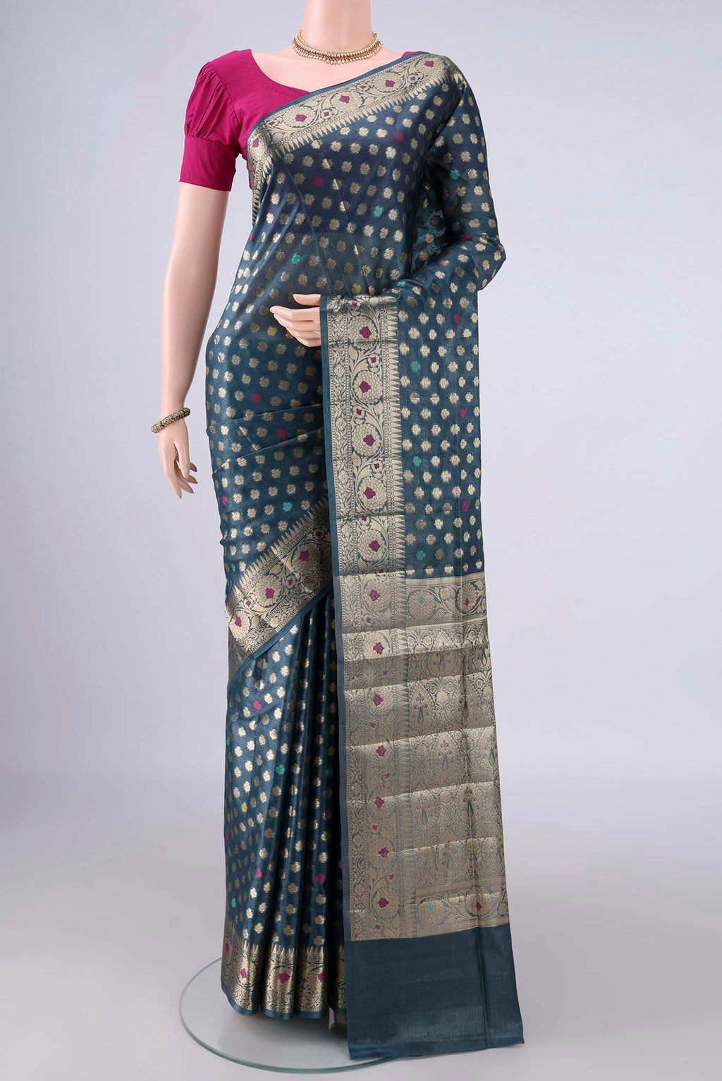 Blue Grey Banarasi Tussar Saree with Zari And Thread Butta on the body and Zari And Thread Border.  displayed on a mannequin