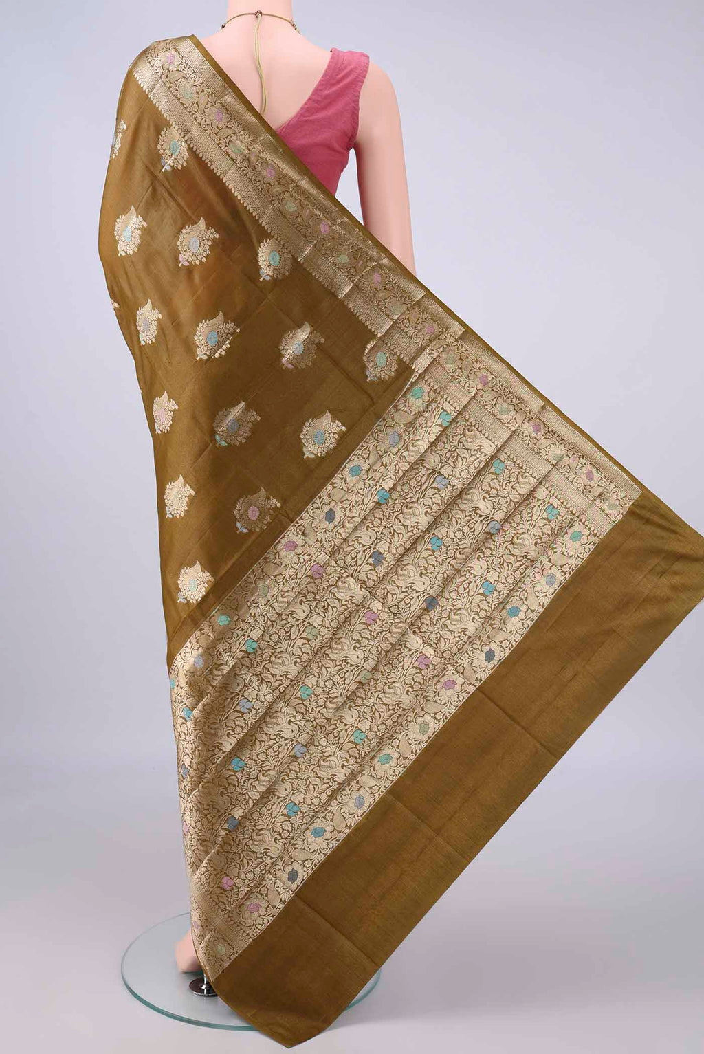 Flat view of Mehandi Green Banarasi Tussar Saree with Zari And Thread Butta on the body and Zari And Thread Border. 