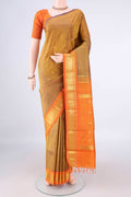Pure Silk Golden Kanjivaram Saree with Zari Butta on the body and Zari Border.  displayed on a mannequin