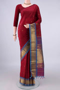 Pure Silk Maroon Kanjivaram Saree with Zari Butta on the body and Zari Border.  displayed on a mannequin