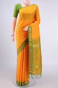 Pure Silk Yellow Kanchipuram Saree with Zari Butta on the body and One Side Border.  displayed on a mannequin