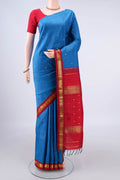 Pure Silk Blue Kanjivaram Saree with Zari Butta on the body and One Side Border.  displayed on a mannequin