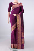 Pure Silk Magenta Kanchipuram Saree with Plain Body and Zari Border.  displayed on a mannequin