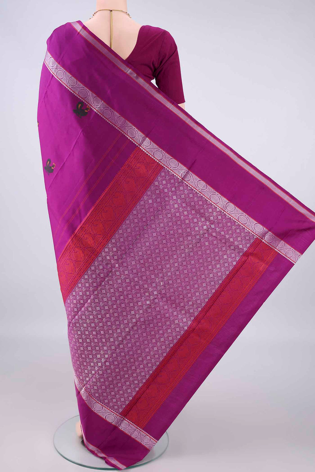 Flat view of Pure Silk Magenta Dual Tone Kanjivaram Saree with Thread Butta on the body and Thread Border. 