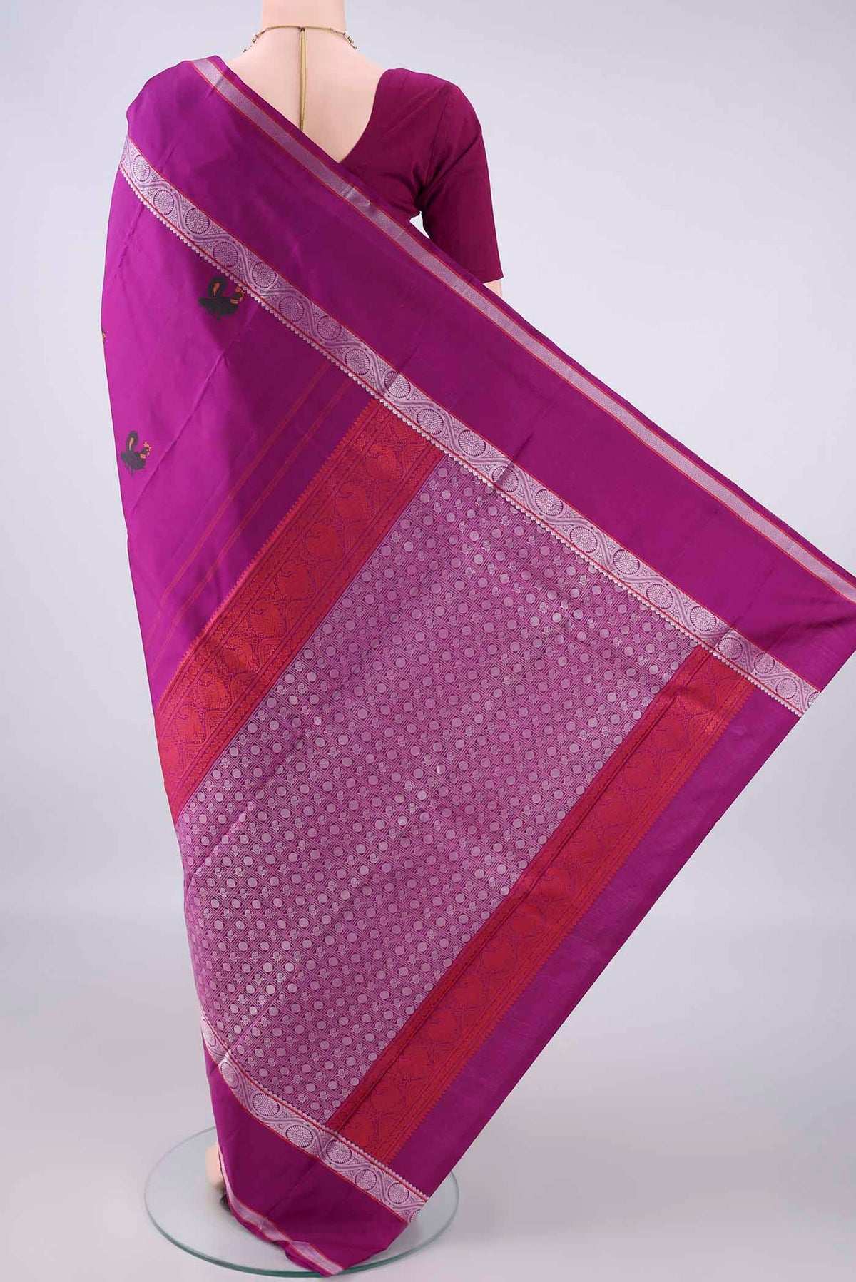Flat view of Pure Silk Magenta Dual Tone Kanjivaram Saree with Thread Butta on the body and Thread Border. 