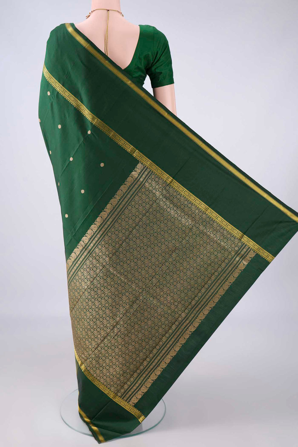 Flat view of Pure Silk Bottle Green Kanjivaram Saree with Thread Butta on the body and Thread Border. 