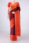 Pure Silk Maroon Kanjivaram Saree with Thread Butta on the body and Thread Border.  displayed on a mannequin