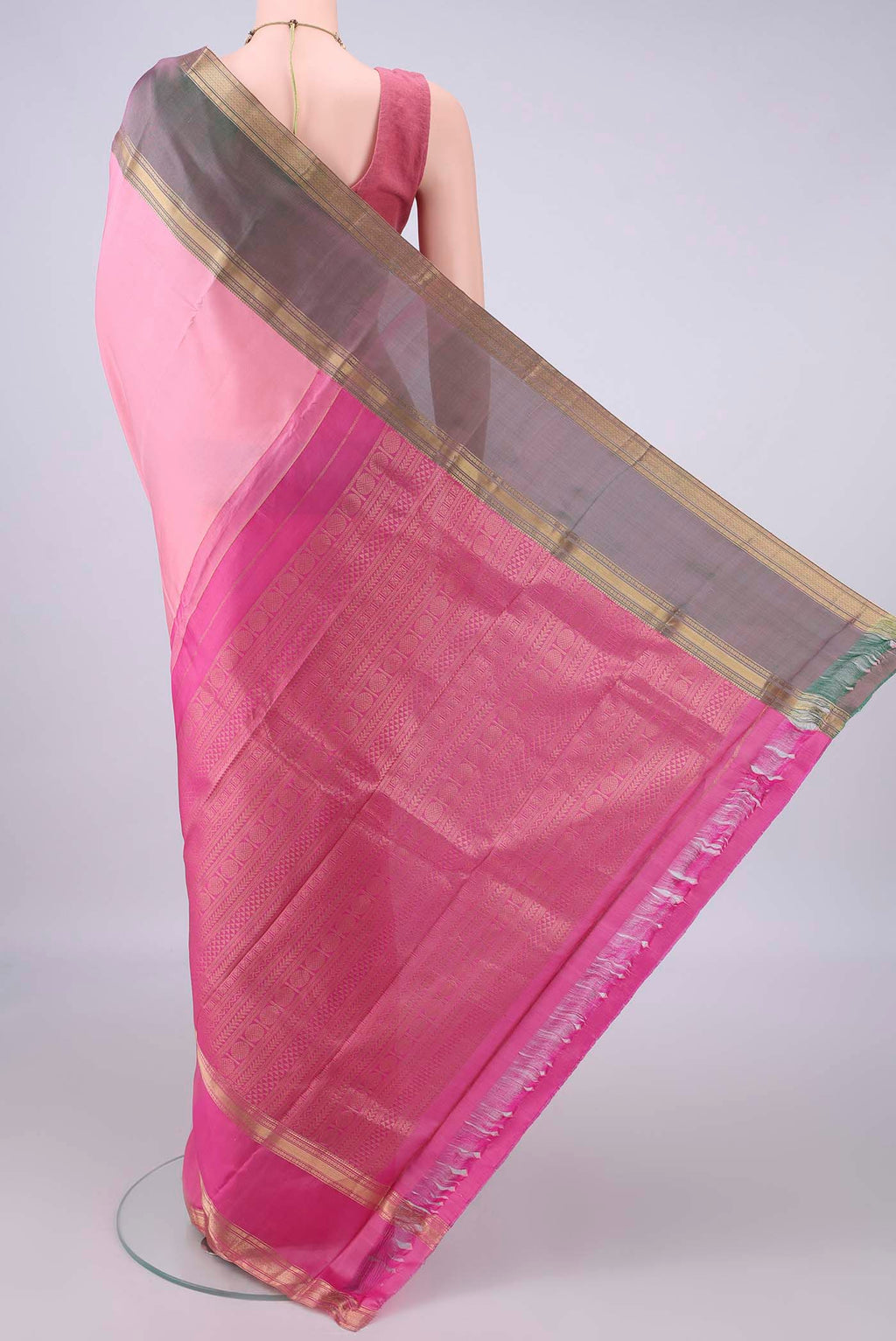 Flat view of Pure Silk Rose pink Dual Tone Kanjivaram Saree with Plain Body and Ganga Jamuna Border. 