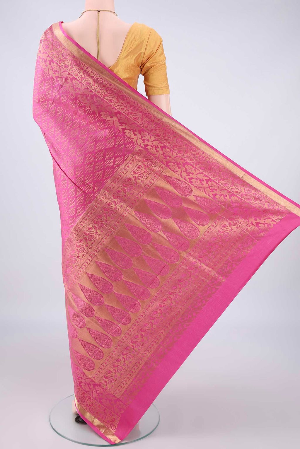 Flat view of Pure Silk Rose pink Soft Saree with Zari Brocade on the body and Zari Border. 