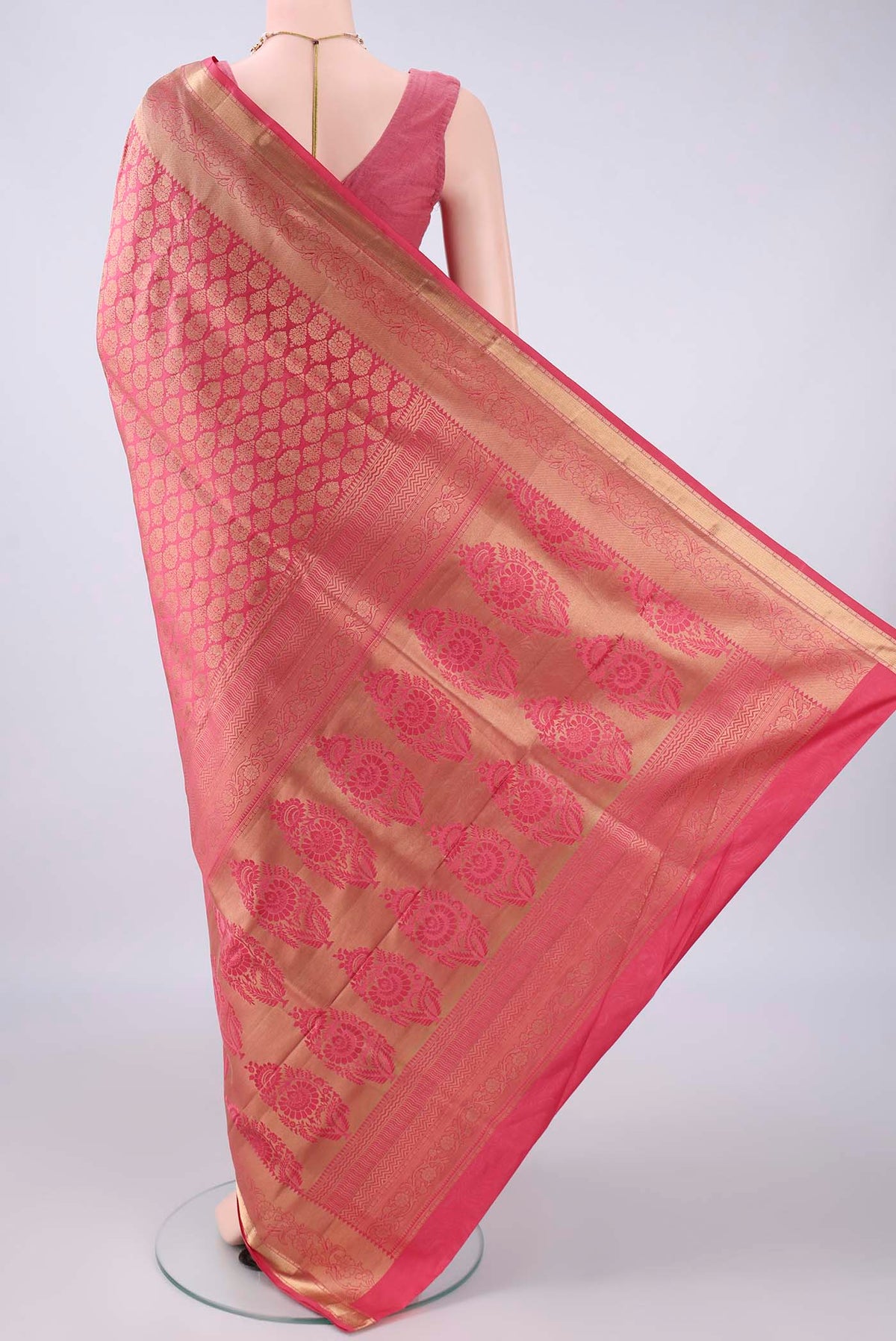 Flat view of Pure Silk Coral Soft Saree with Zari Brocade on the body and Zari Border. 
