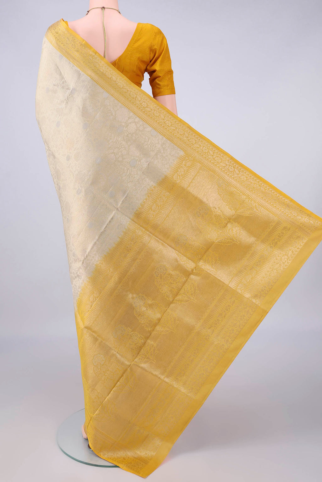 Flat view of Pure Silk Dark Beige Soft Saree with Zari Brocade on the body and Zari Border. 