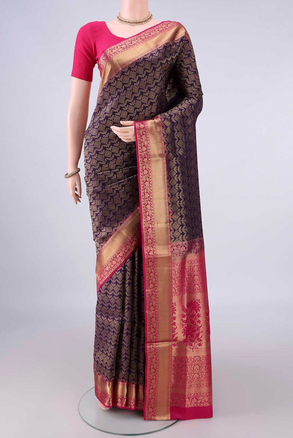 Pure Silk Purple Soft Saree with Zari Brocade on the body and Zari Border.  displayed on a mannequin