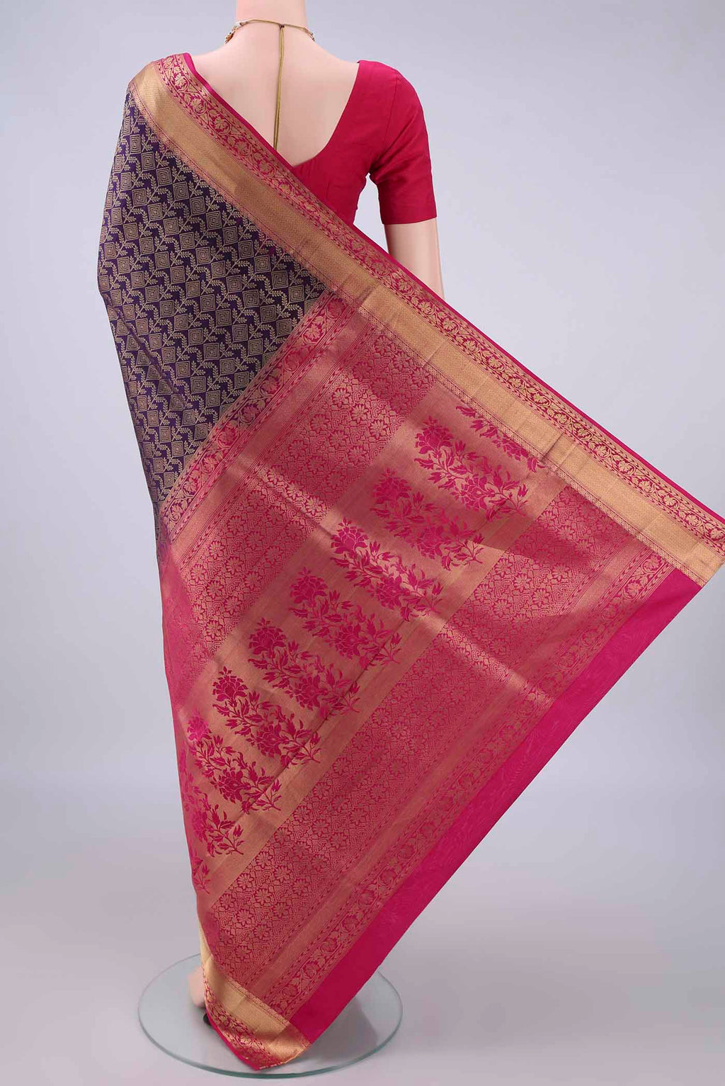 Flat view of Pure Silk Purple Soft Saree with Zari Brocade on the body and Zari Border. 