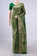 Pure Silk Bottle Green Soft Saree with Zari Brocade on the body and Zari Border.  displayed on a mannequin