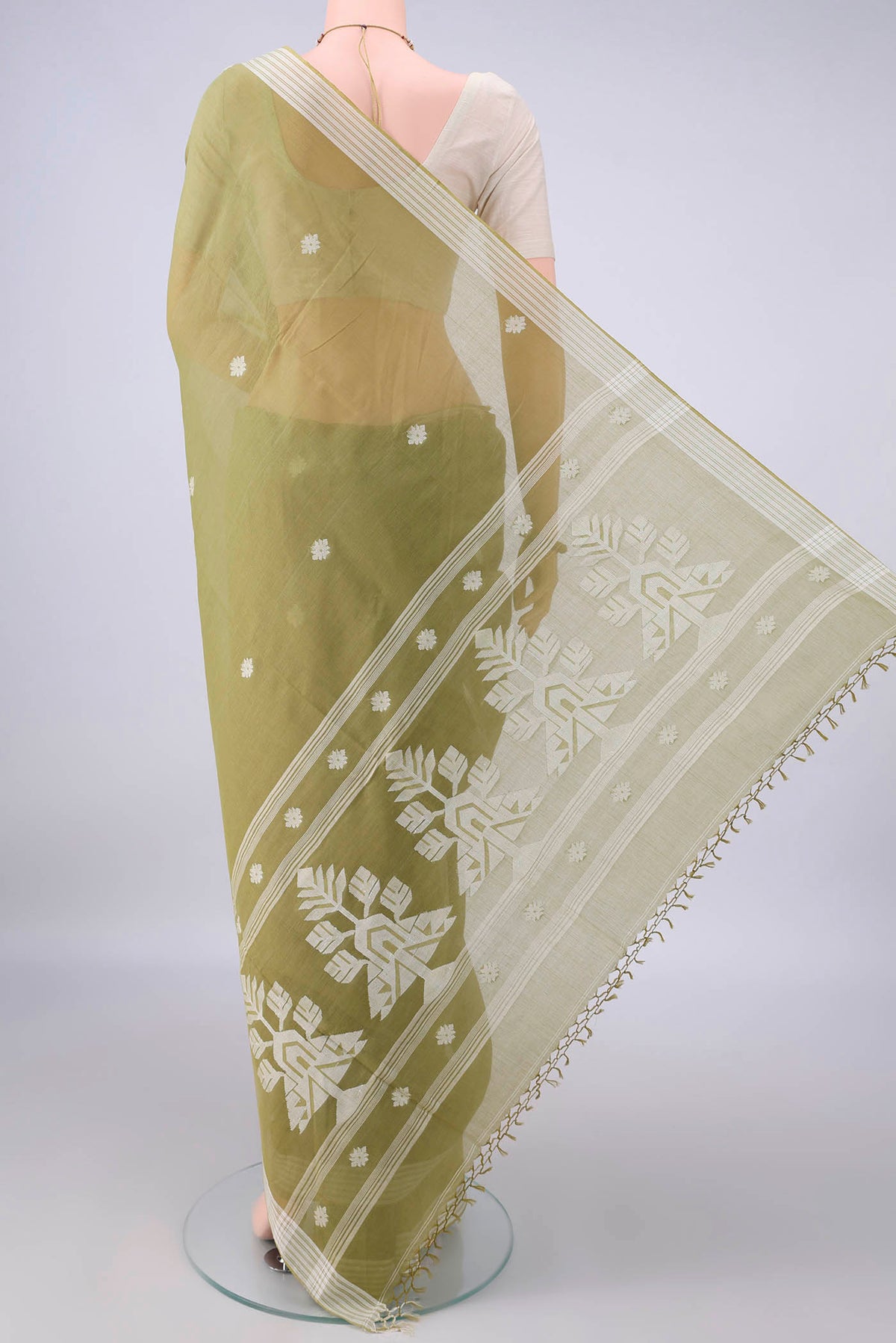 Flat view of Light Green Bengal Cotton Saree with Thread Butta on the body and Plain Border. 