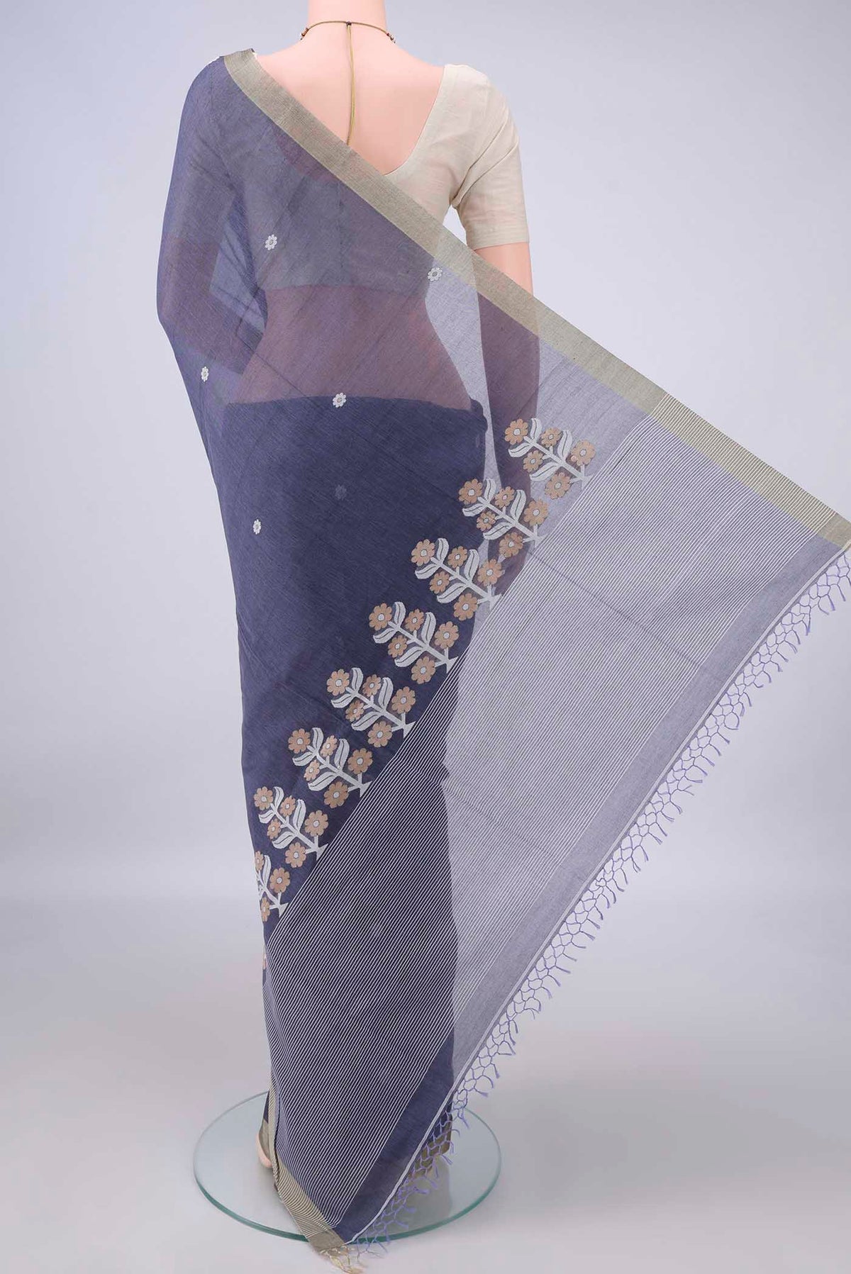 Flat view of Blue Grey Bengal Cotton Saree with Thread Butta on the body and Plain Border. 