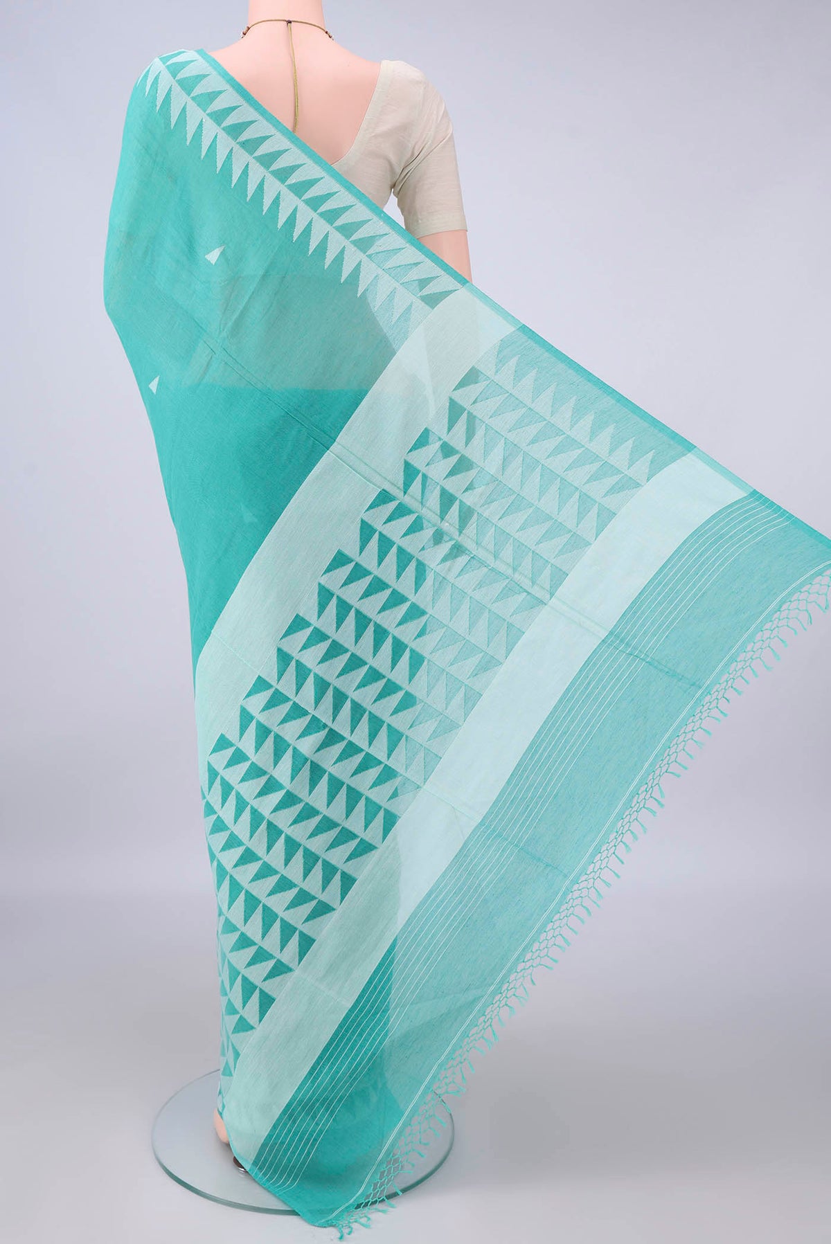 Flat view of Turquoise Bengal Cotton Saree with Thread Butta on the body and Thread Border. 
