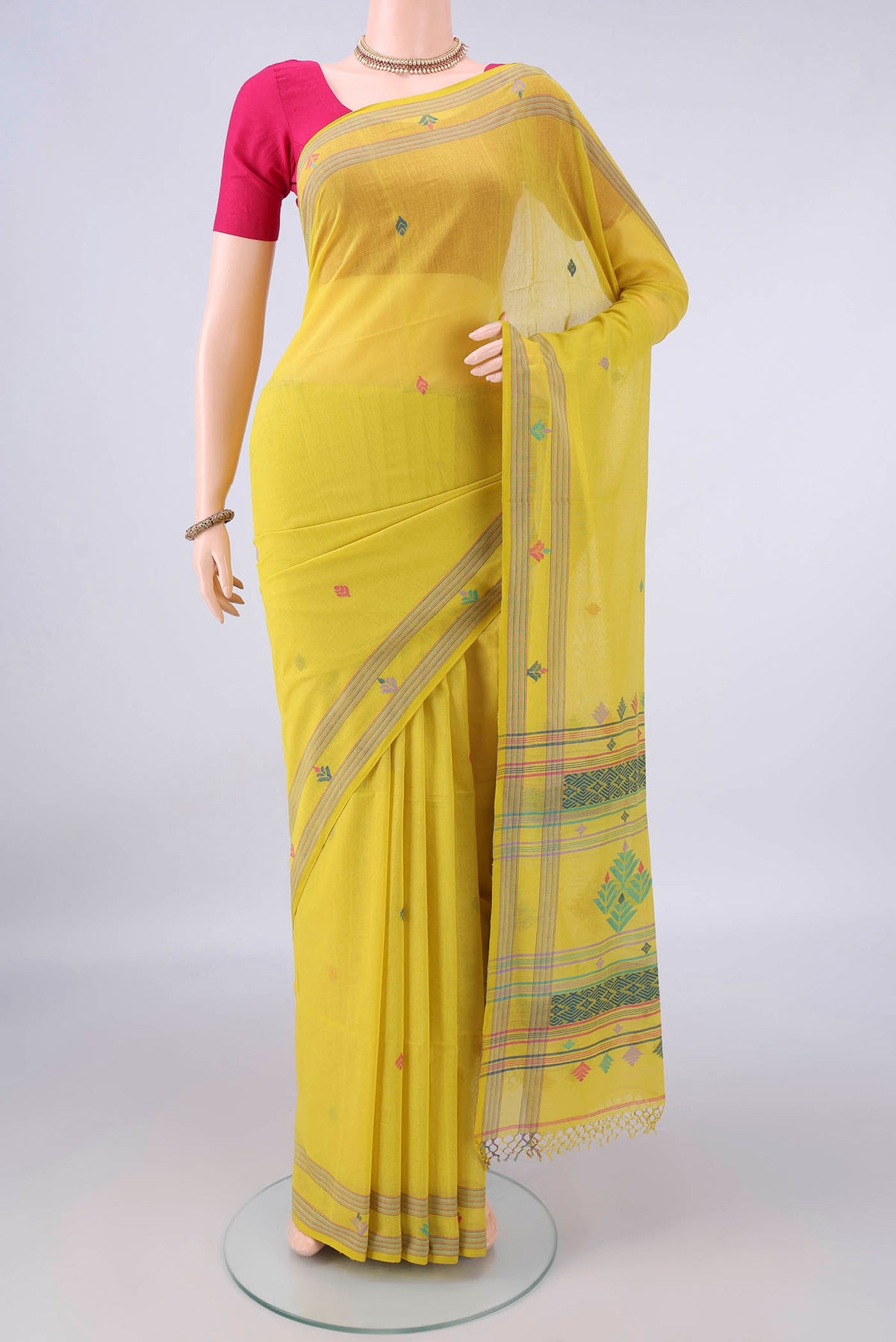 Lemon Yellow Bengal Cotton Saree with Thread Butta on the body and Plain Border.  displayed on a mannequin
