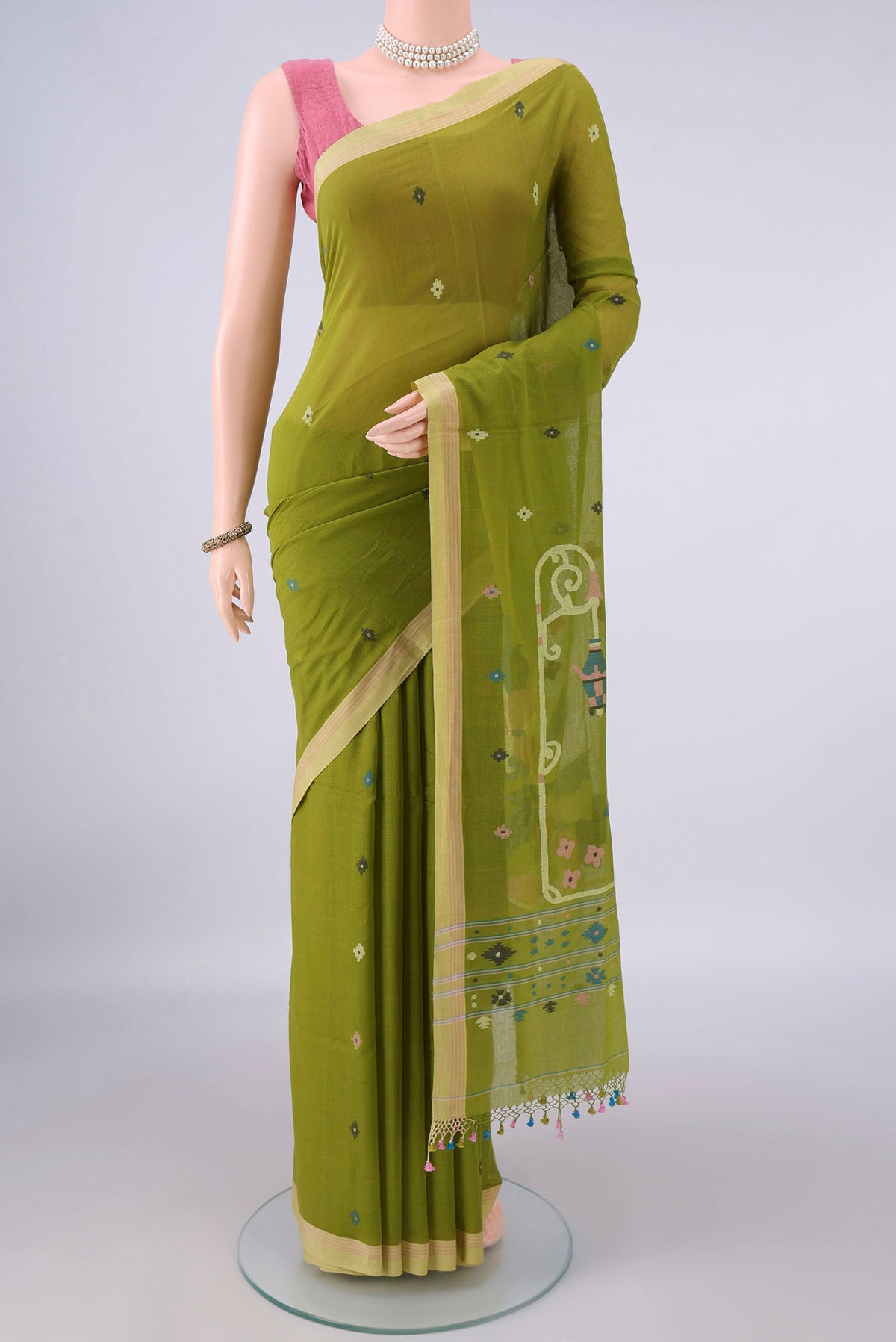 Mehandi Green Bengal Cotton Saree with Thread Butta on the body and Plain Border.  displayed on a mannequin