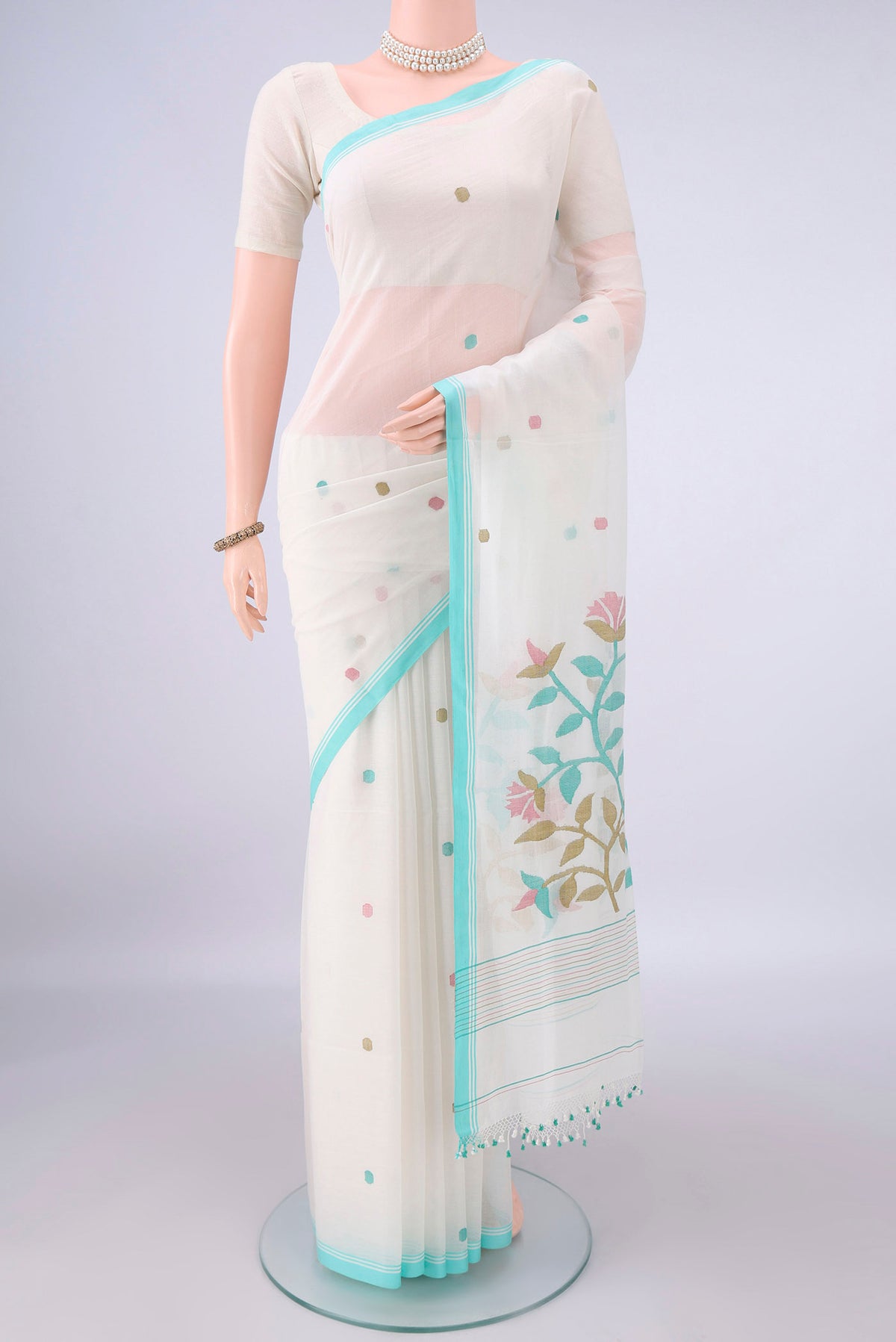 Off White Bengal Cotton Saree with Thread Butta on the body and Plain Border.  displayed on a mannequin