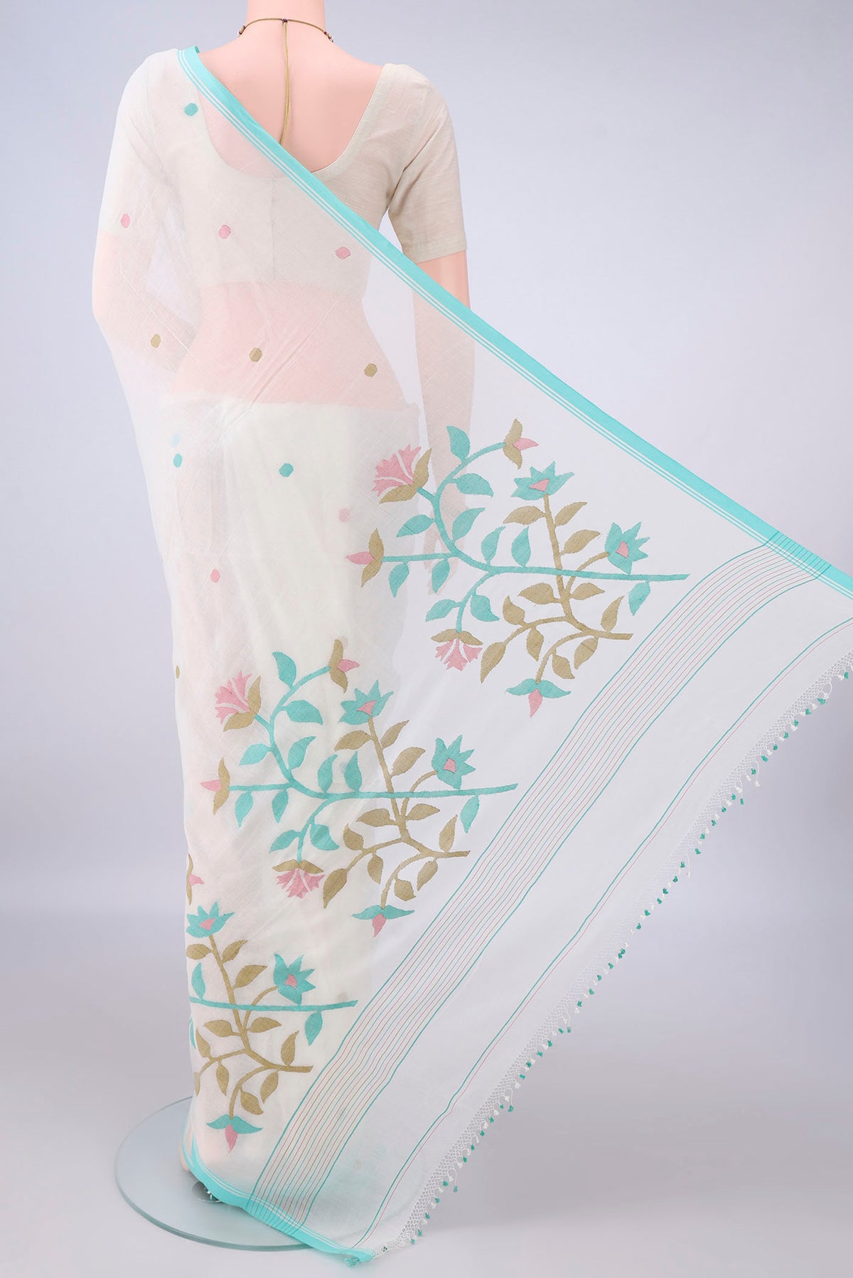 Flat view of Off White Bengal Cotton Saree with Thread Butta on the body and Plain Border. 
