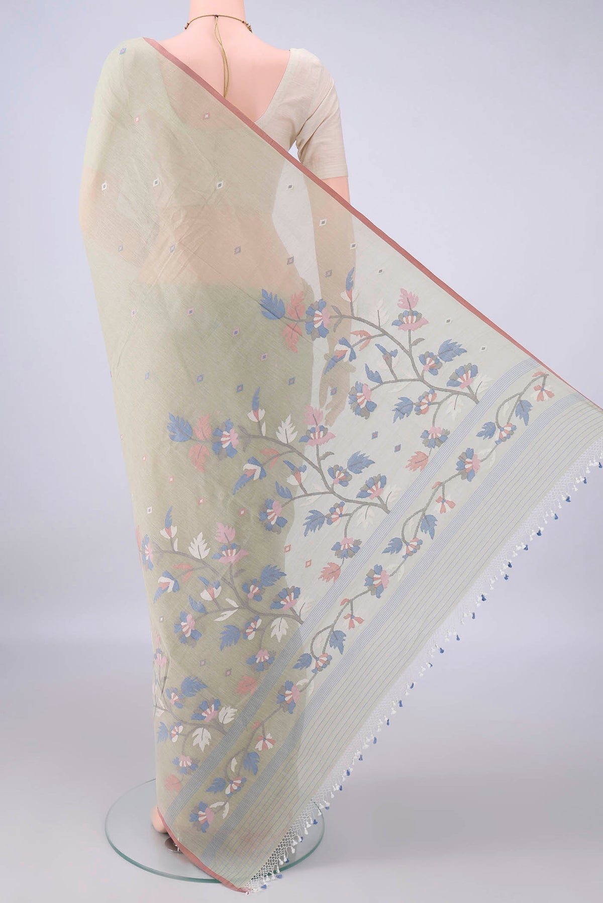 Flat view of Sage Green Bengal Cotton Saree with Thread Butta on the body and Plain Border. 