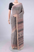 Cream Maheshwari Cotton Saree with Printed design on the body and Zari Border.  displayed on a mannequin