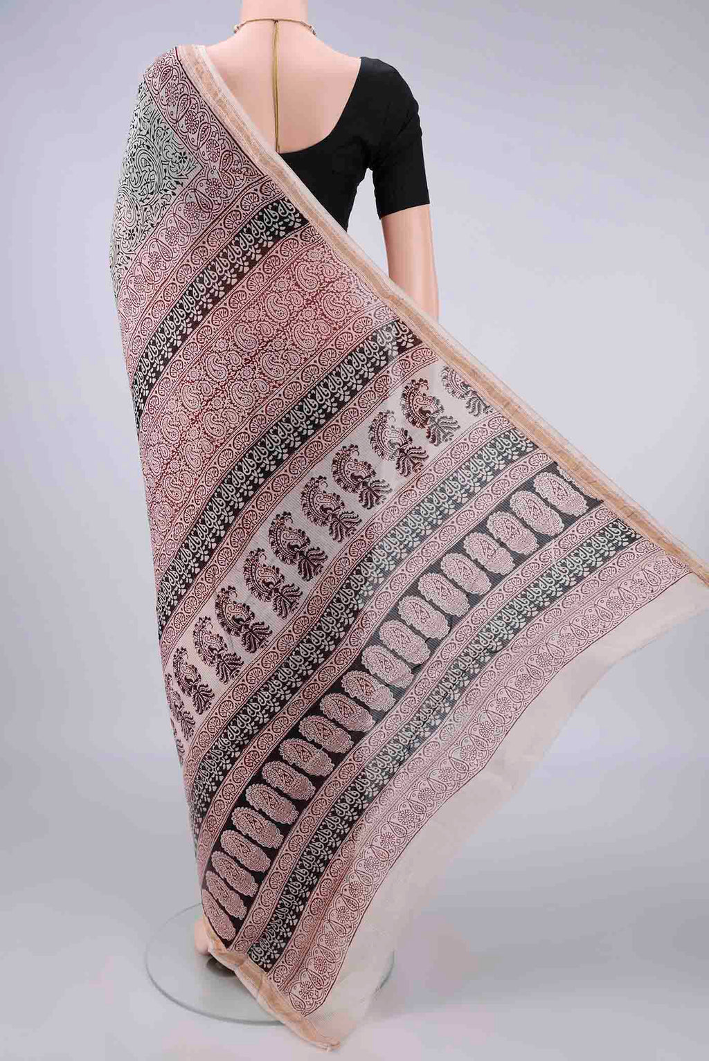 Flat view of Cream Maheshwari Cotton Saree with Printed design on the body and Zari Border. 