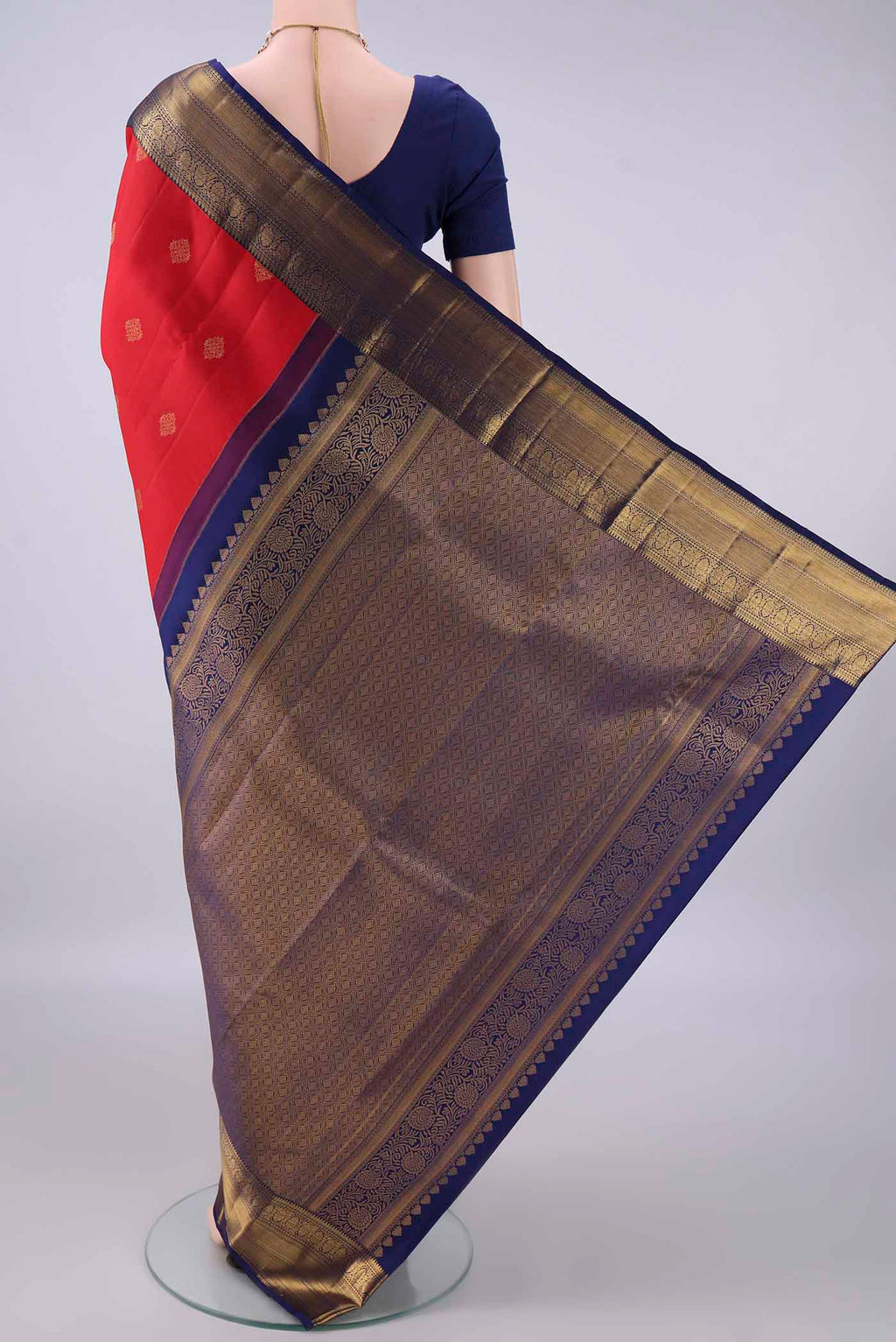 Flat view of Pure Silk Red Kanchipuram Saree with Zari Butta on the body and Zari Border. 