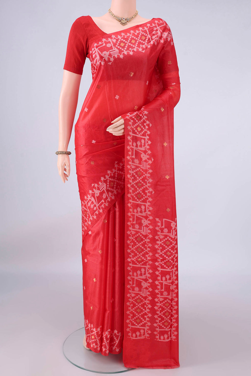 Red Banarasi Tussar Saree with Jamdani on the body and Zari And Thread Border.  displayed on a mannequin