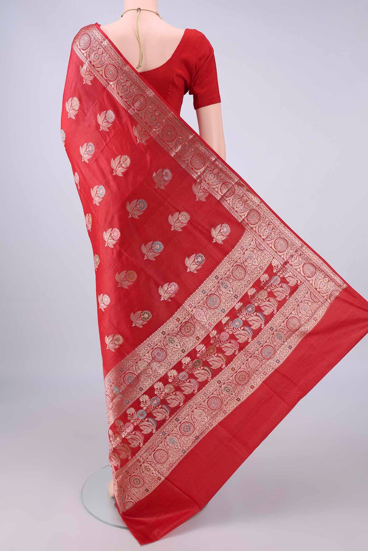 Flat view of Red Banarasi Tussar Saree with Zari And Thread Butta on the body and Zari And Thread Border. 