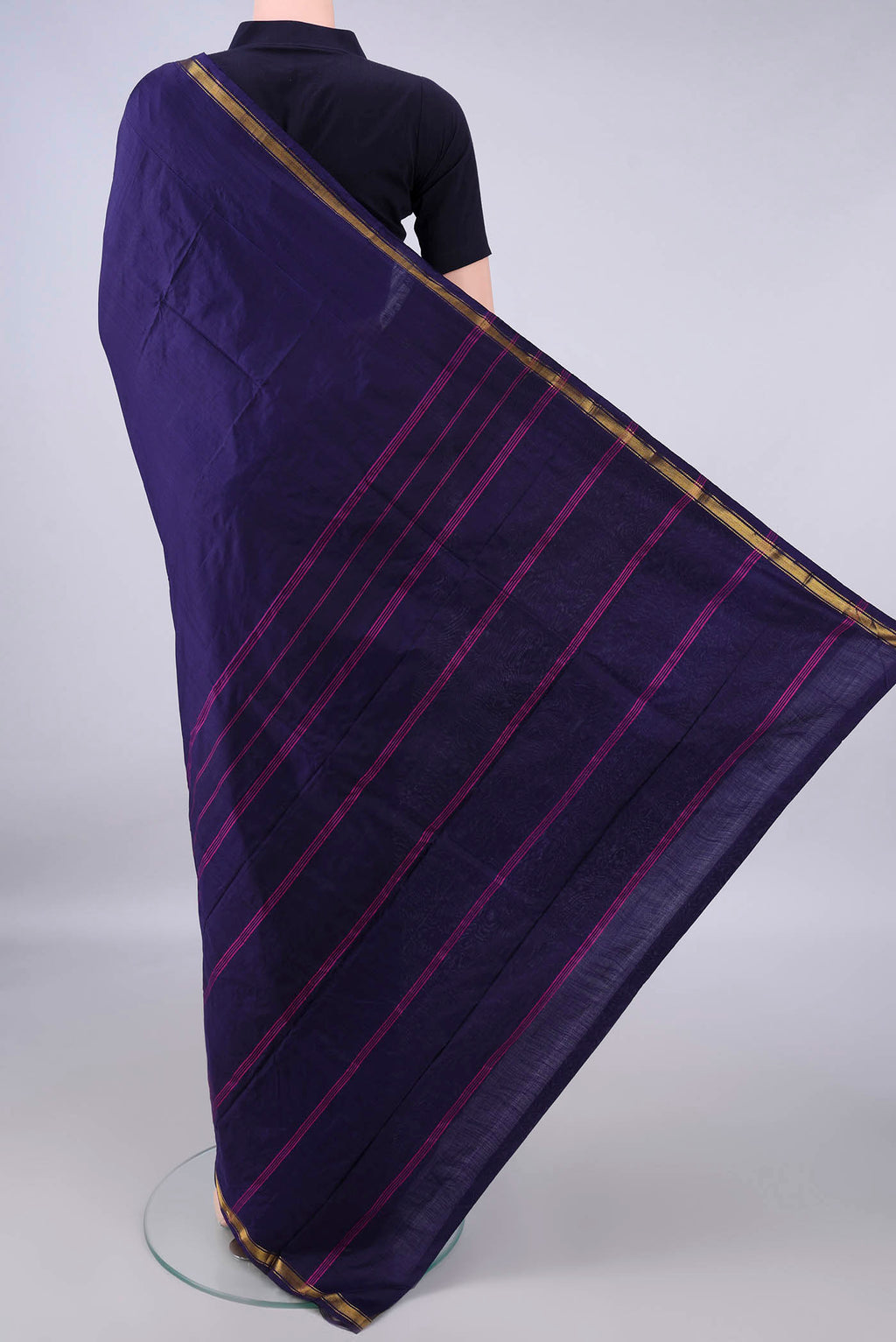 Flat view of Pure Silk Navy Blue Kanchipuram Saree with Plain Body and Zari Border. 