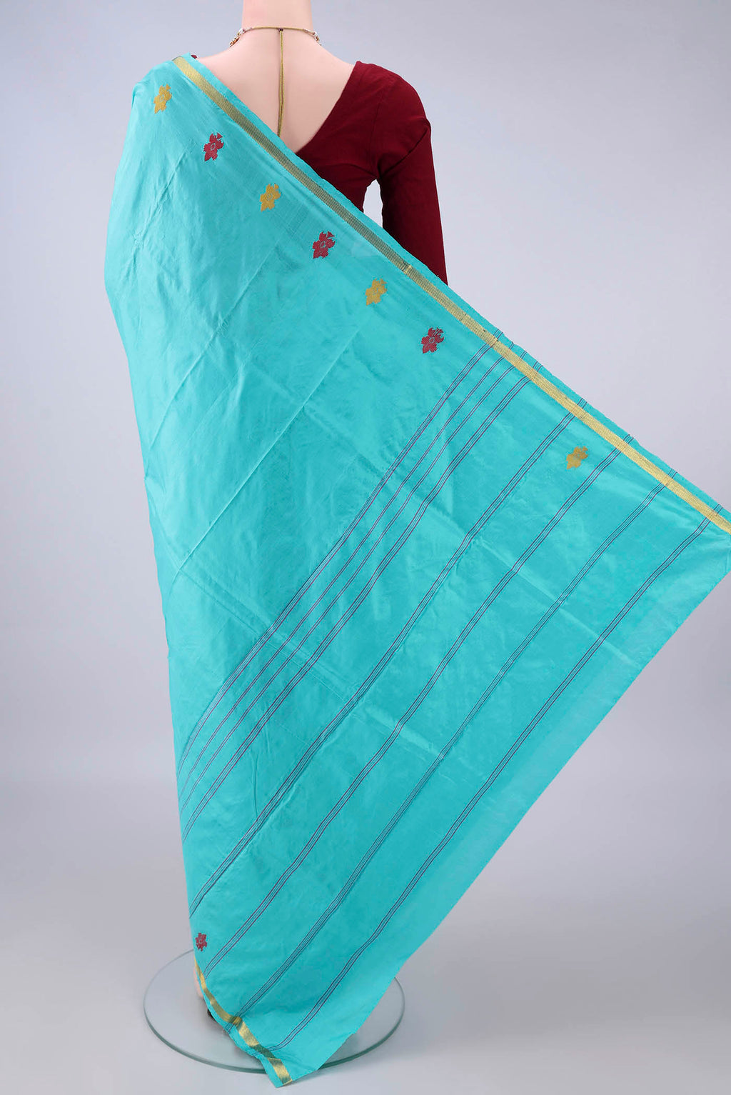 Flat view of Pure Silk Sky Blue Kanchipuram Saree with Plain Body and Zari And Thread Border. 