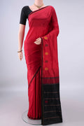 Pure Silk Red Kanchipuram Saree with Plain Body and Zari Border.  displayed on a mannequin