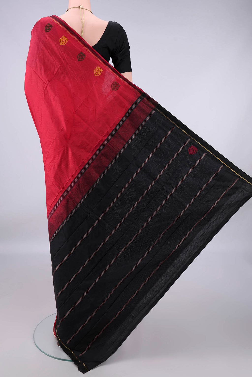 Flat view of Pure Silk Red Kanchipuram Saree with Plain Body and Zari Border. 