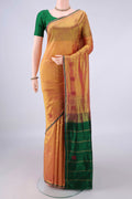 Pure Silk Mustard Kanchipuram Saree with Plain Body and Zari Border.  displayed on a mannequin