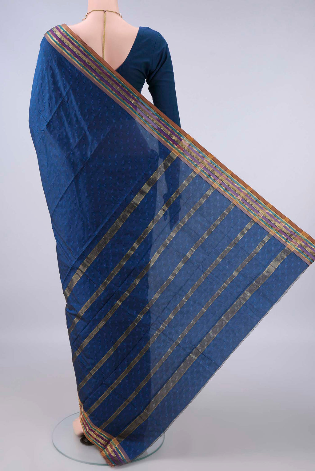 Flat view of Blue Blended Bangalore Silk Saree with Jacquard design on the body and Zari Border. 