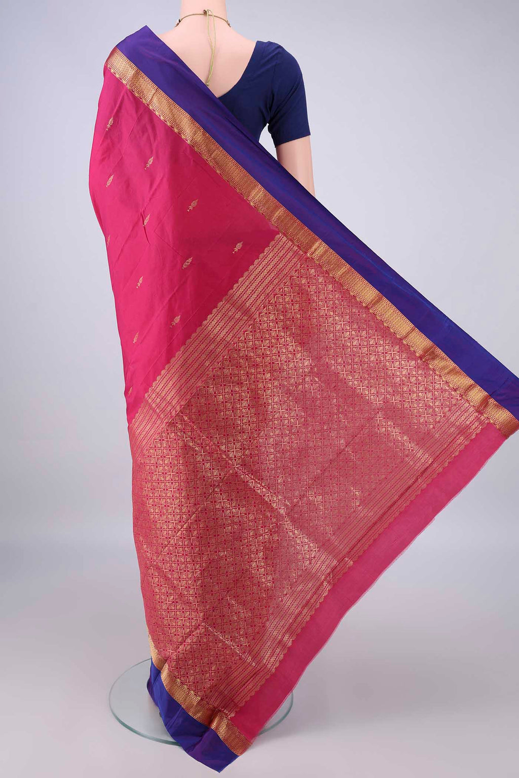 Flat view of Rani Pink Blended Bangalore Silk Saree with Zari Butta on the body and Zari Border. 