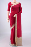 Deep Red Mysore Crepe Saree with Plain Body and Zari Border.  displayed on a mannequin