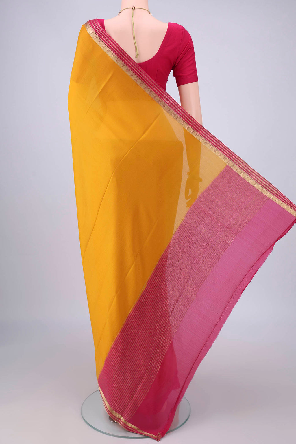 Flat view of Mustard Mysore Crepe Saree with Plain Body and Zari Border. 
