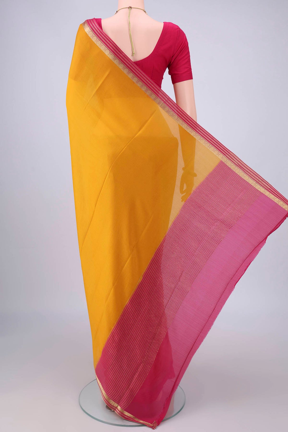Flat view of Mustard Mysore Crepe Saree with Plain Body and Zari Border. 