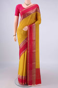 Yellow Mysore Crepe Saree with Plain Body and Zari Border.  displayed on a mannequin