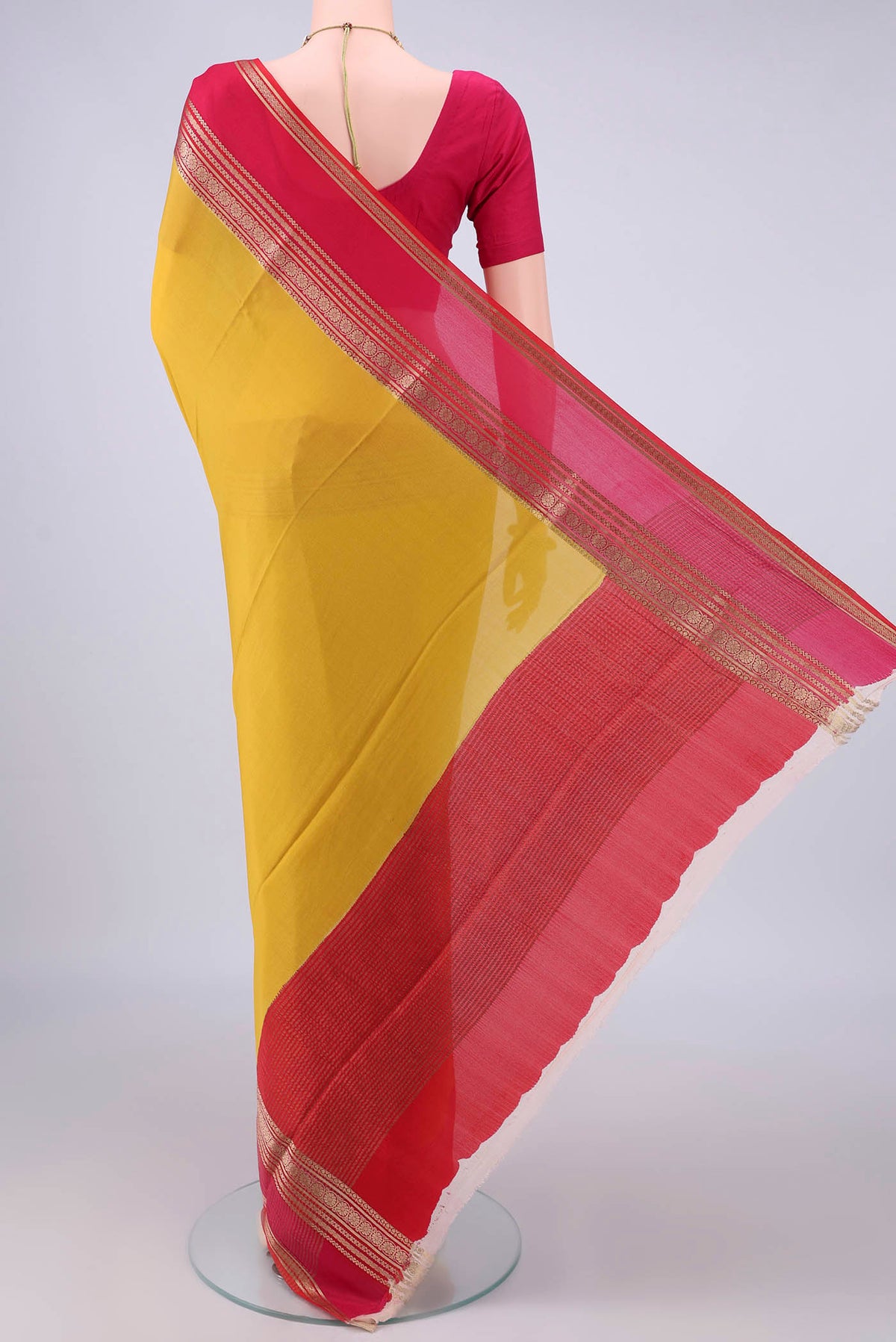 Flat view of Yellow Mysore Crepe Saree with Plain Body and Zari Border. 