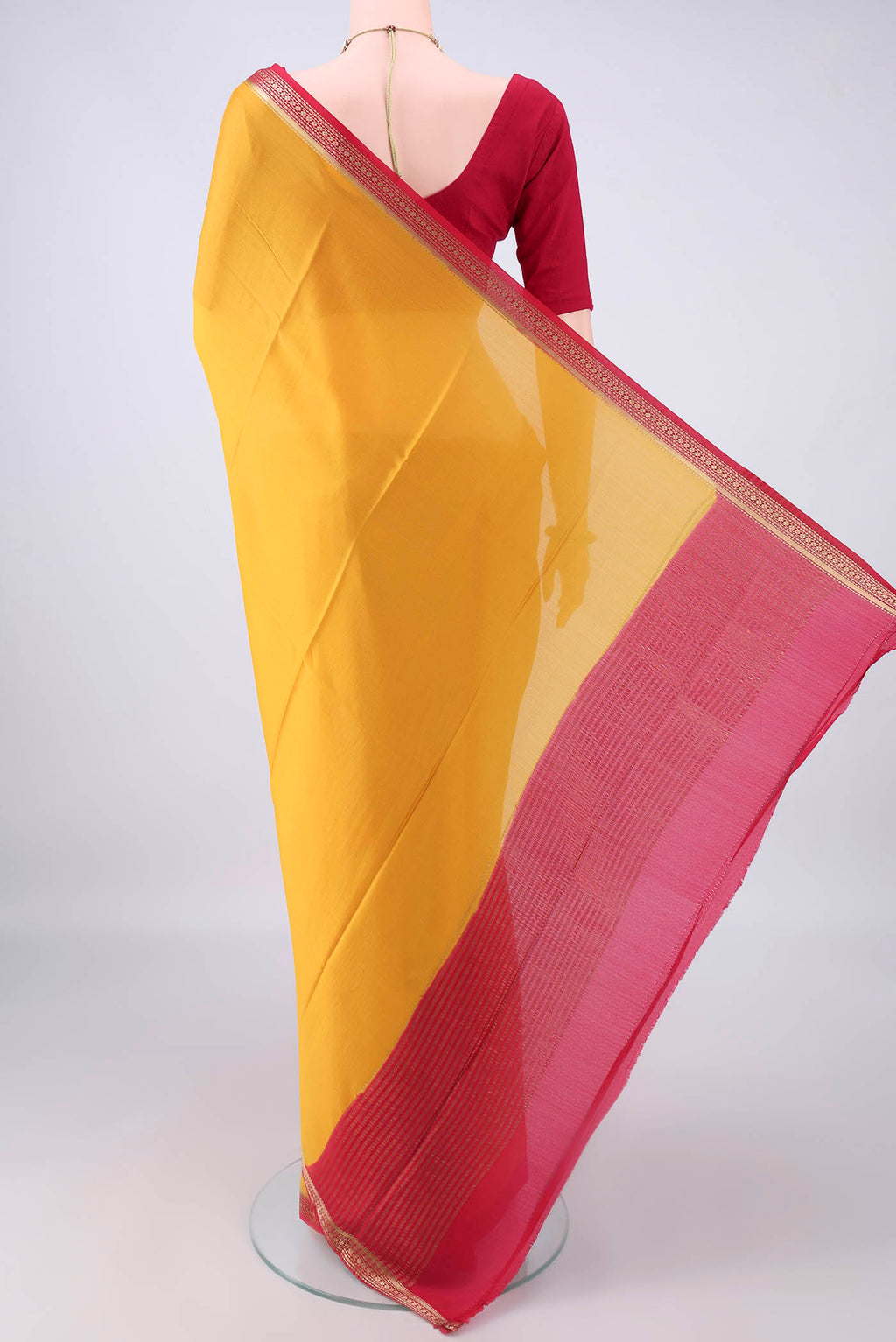 Flat view of Mustard Mysore Crepe Saree with Plain Body and Zari Border. 