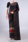 Black Tussar Saree with Printed design on the body and Zari Border.  displayed on a mannequin