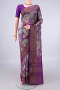Purple Tussar Saree with Printed design on the body and Zari Border.  displayed on a mannequin