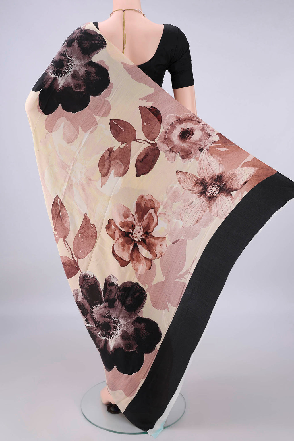 Flat view of Sandal Crepe Saree with Printed design on the body and Without Border. 