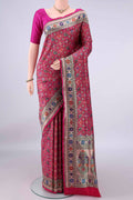 Pure Silk Rani Pink Banarasi Saree with Zari Brocade on the body and Zari Border.  displayed on a mannequin