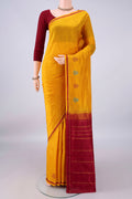 Pure Silk Mustard Kanchipuram Saree with Plain Body and Zari Border.  displayed on a mannequin