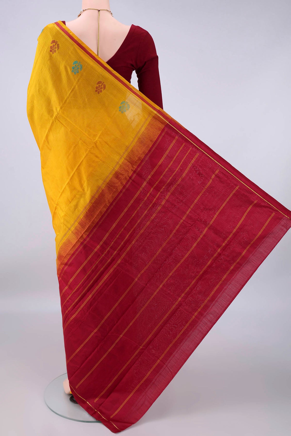 Flat view of Pure Silk Mustard Kanchipuram Saree with Plain Body and Zari Border. 